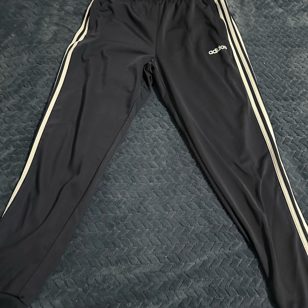 Adidas Black Sweatpants with Iconic Stripes